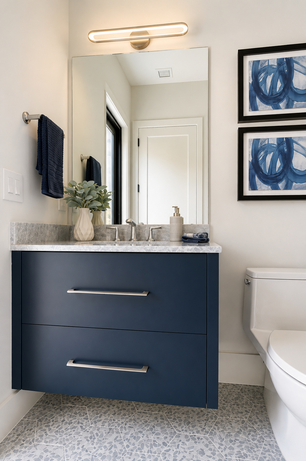 Navy blue vanity with stone top | Sunshine Alliance, South Florida