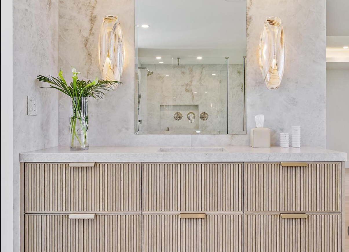 White marble floating vanity | Sunshine Alliance, Deerfield Beach FL