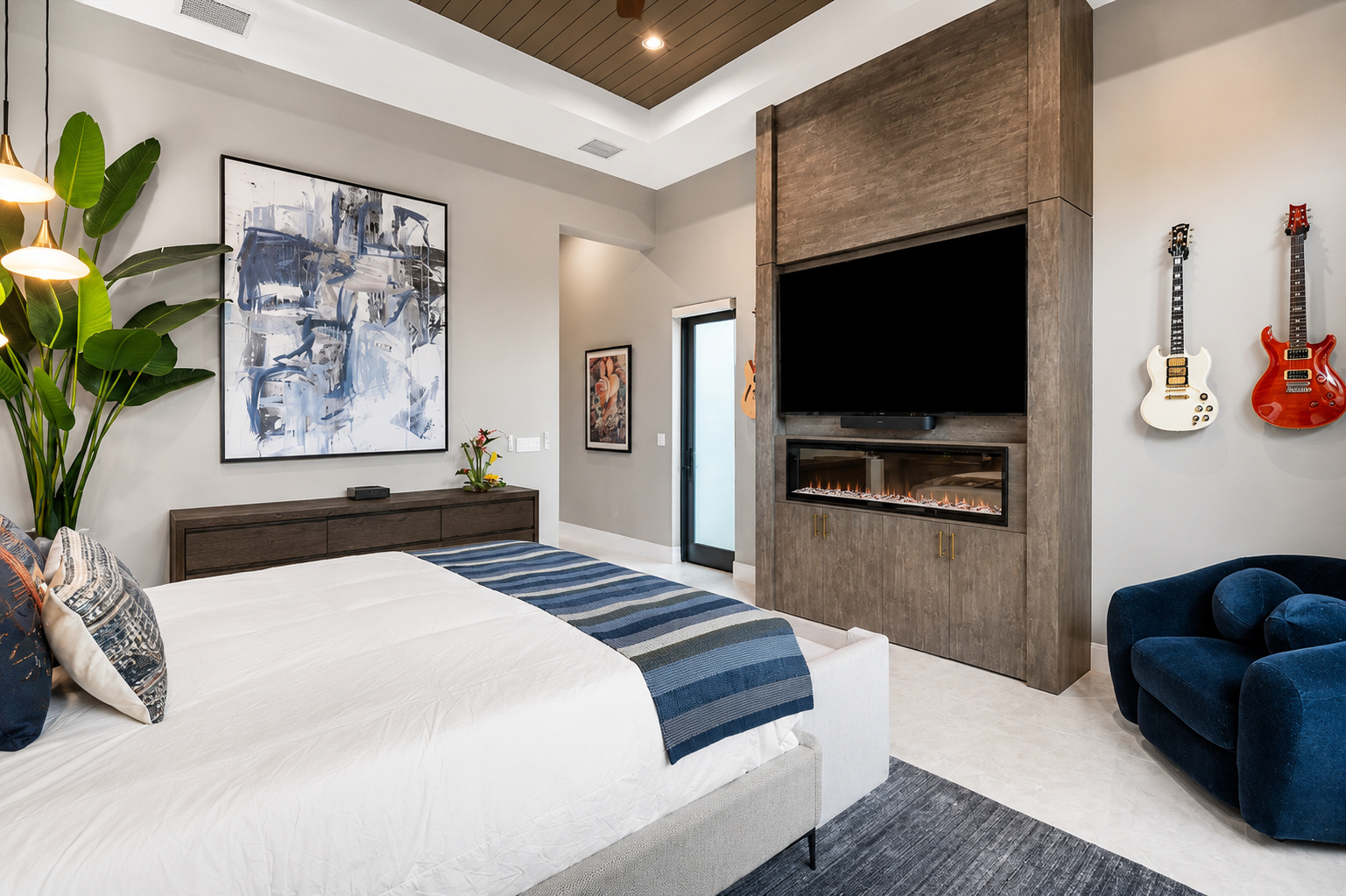 Bedroom fireplace feature wall | Sunshine Alliance, Boca Raton FL