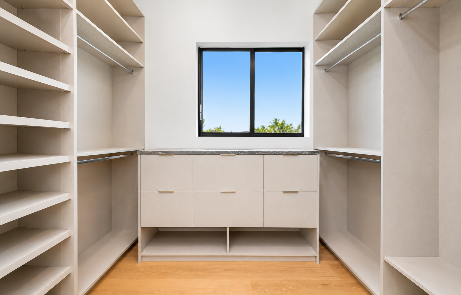 Minimalist walk-in closet with natural light | Sunshine Alliance, South Florida