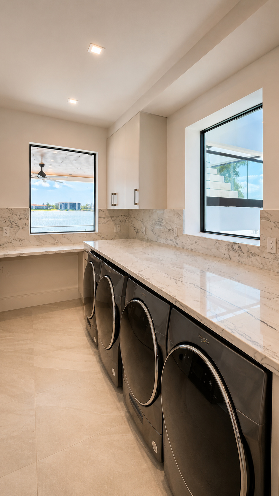 Modern laundry built-ins with waterfront view | Sunshine Alliance, South Florida