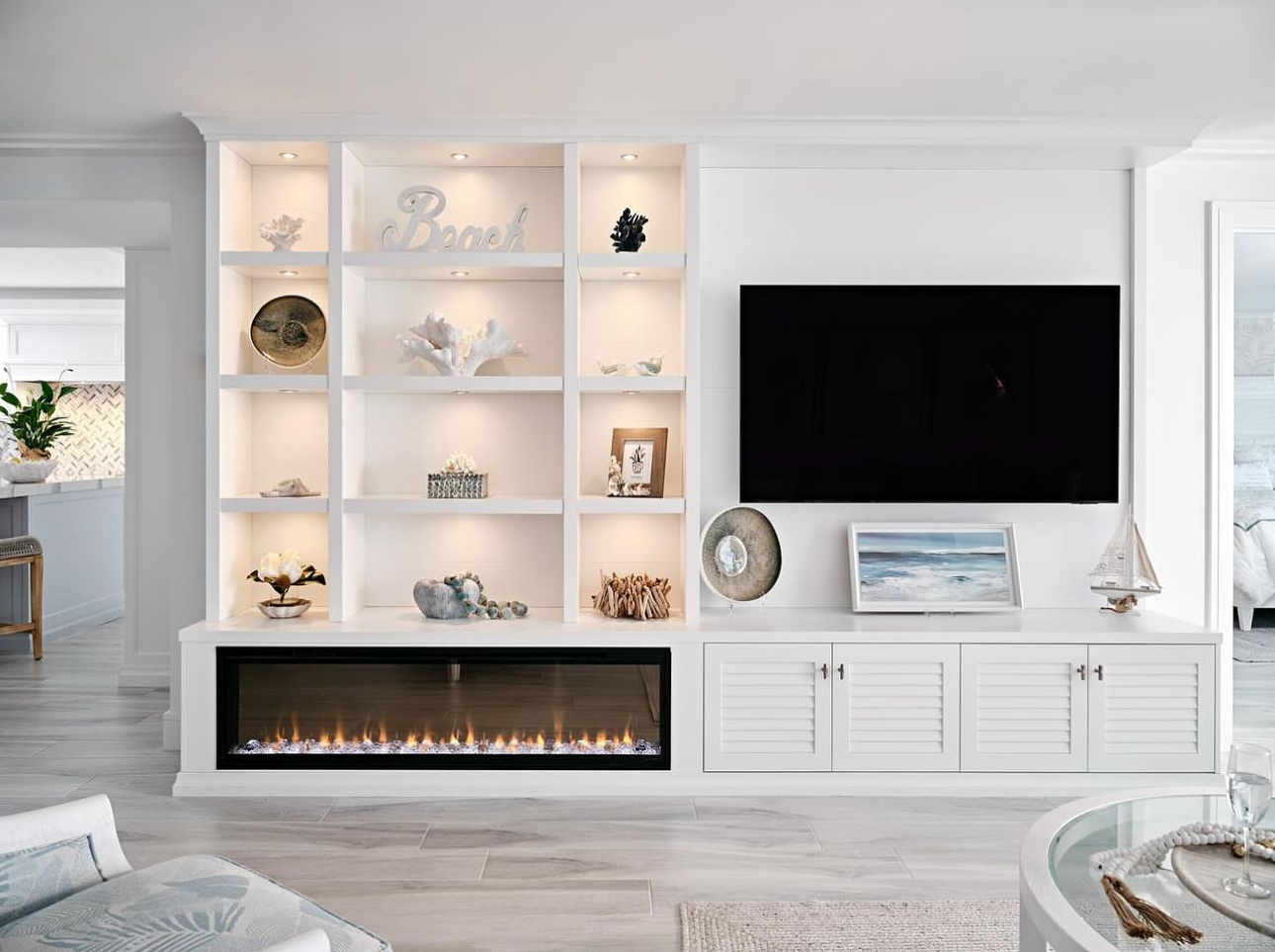 White built-in shelving and fireplace | Sunshine Alliance, South Florida
